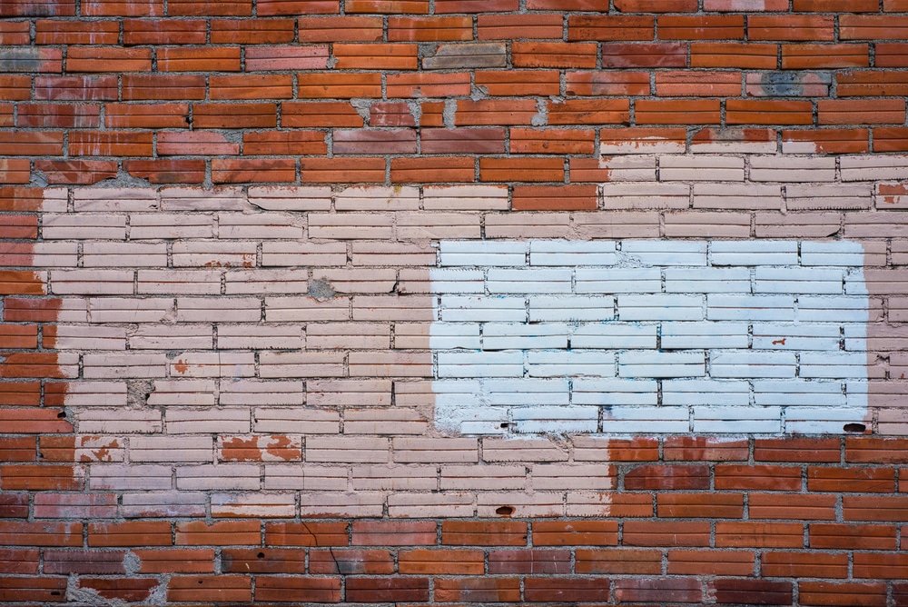 Graffiti verwijderen Purmerend met inspectie van portieken, VvE-muren, galerijen en achterpaden in Purmerend